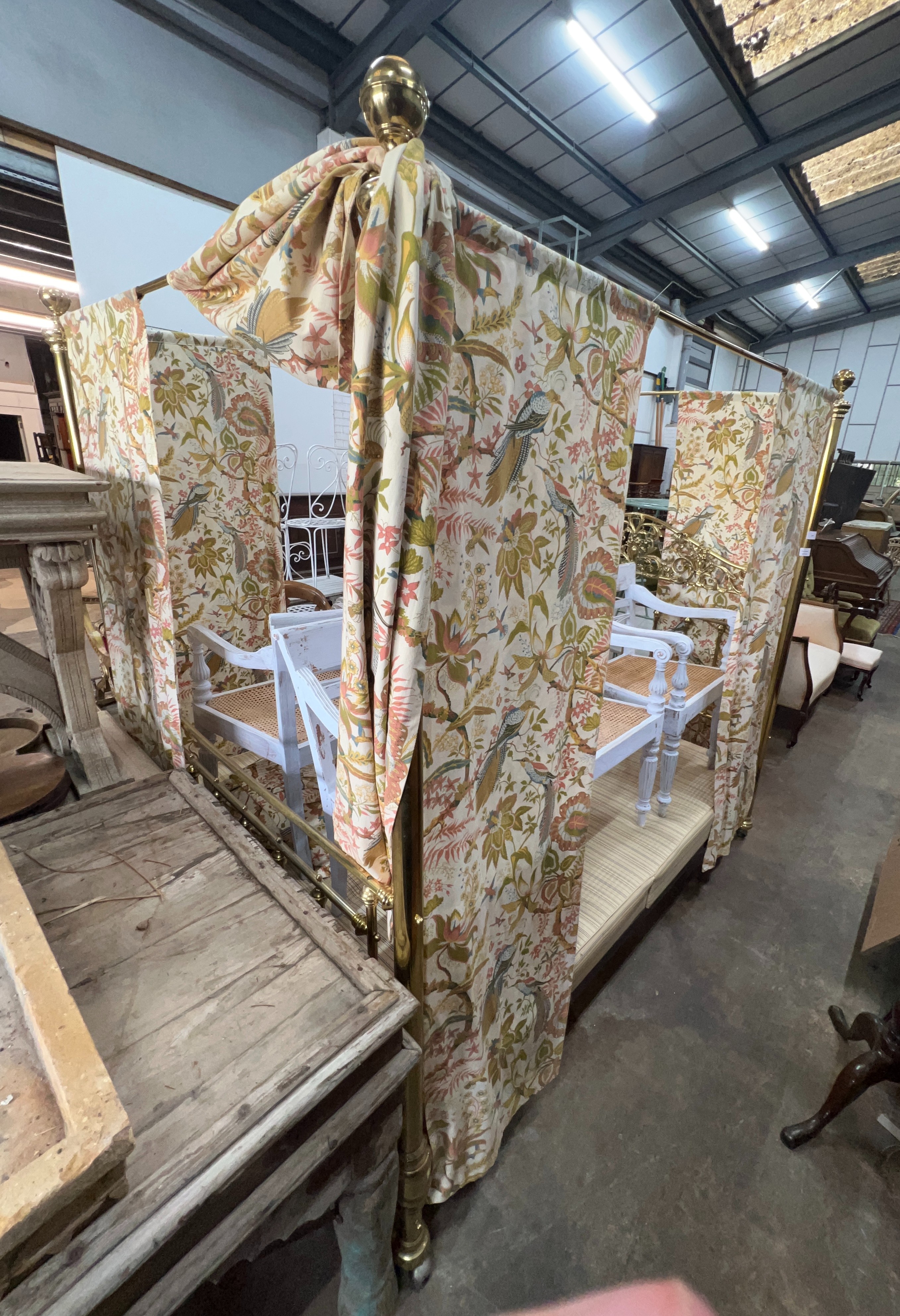 A Victorian style brass four poster bed, width 152cm, length 210cm, height 208cm
